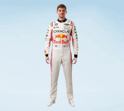 A man wearing a full Oracle Red Bull Racing driver's racing suit stands against a light blue gradient background. The white suit features prominent red and yellow Red Bull and Oracle logos, along with sponsor logos like Castor, Sumo, and BFGoodrich.
