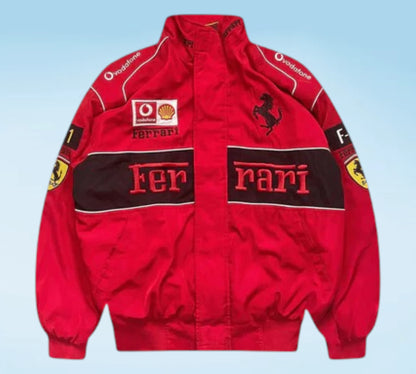Red Ferrari jacket with branding on a light blue background