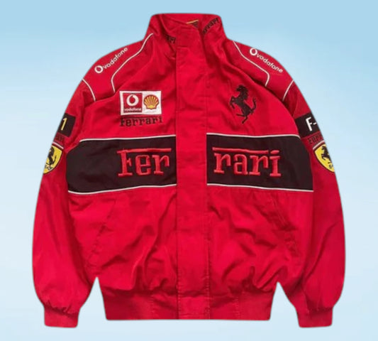 Red Ferrari jacket with branding on a light blue background