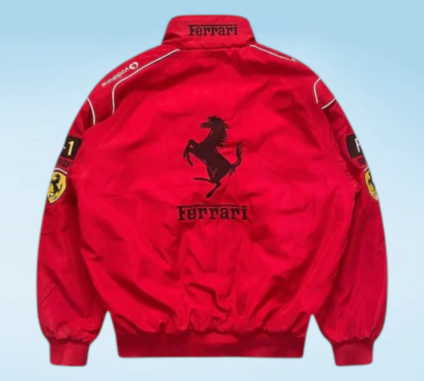 Black Ferrari jacket with red logo on a light blue background