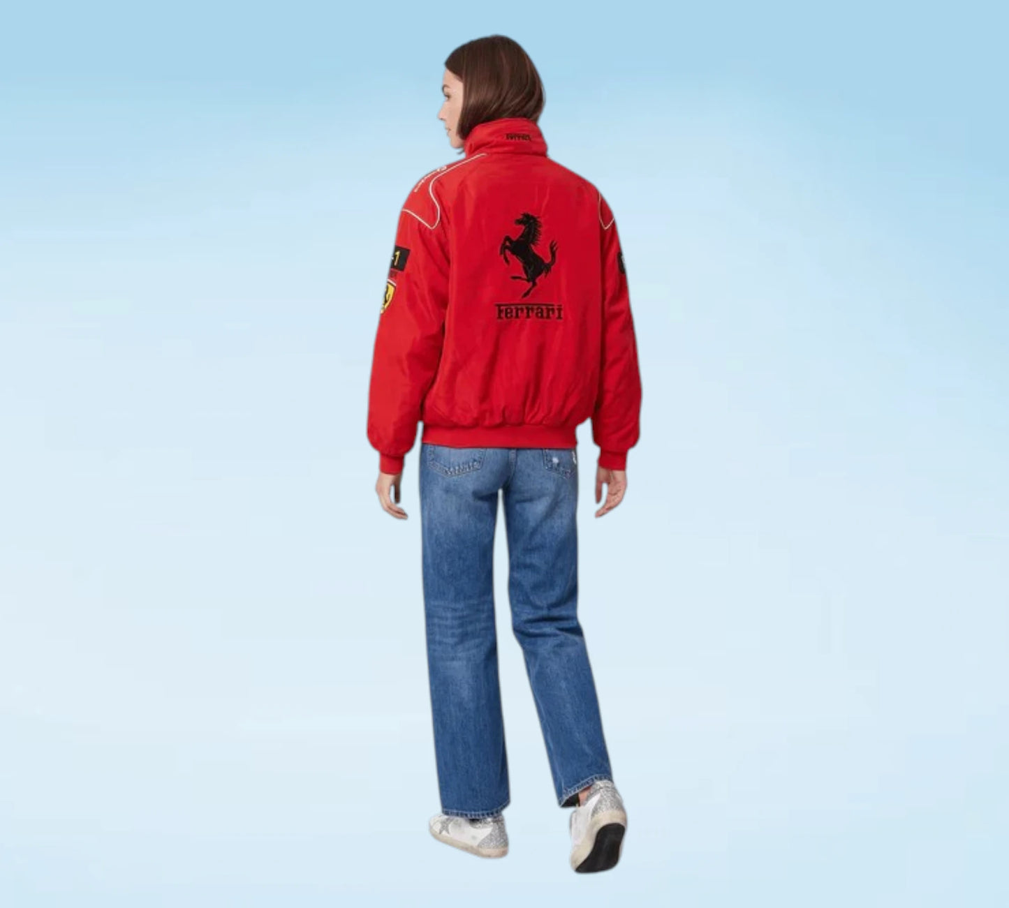 Person wearing a red jacket with a logo on a light blue background