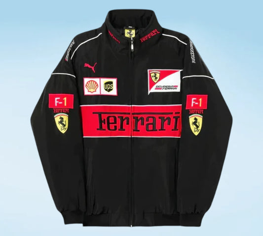 Black Ferrari jacket with various logos on a light blue background