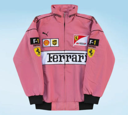 Pink jacket with Ferrari and Puma logos on a light blue background