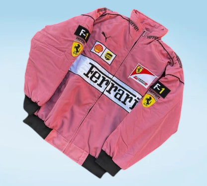 Pink racing jacket with Ferrari and F1 logos on a light blue background