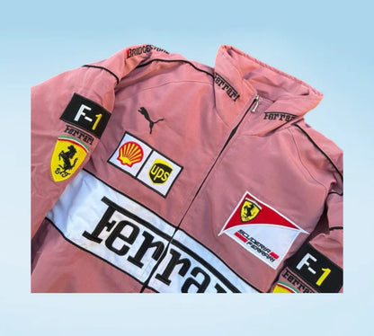Pink racing jacket with various logos on a light blue background