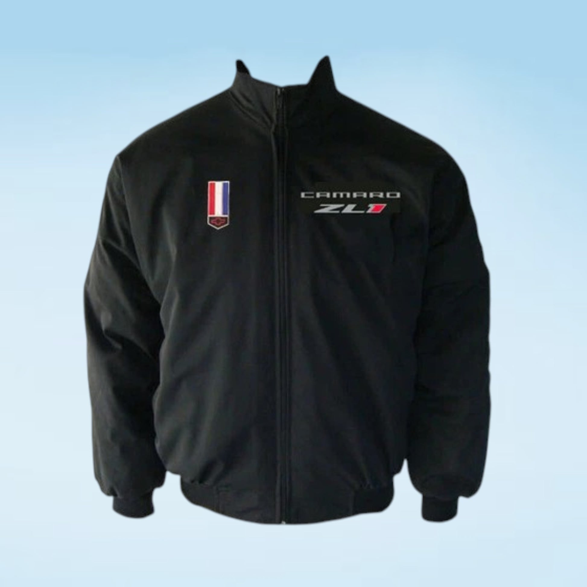 A black zip-up jacket featuring a 'CAMARO ZL1' embroidered logo on the left chest and a small vertical tricolor flag patch on the right chest, displayed against a light blue gradient background.