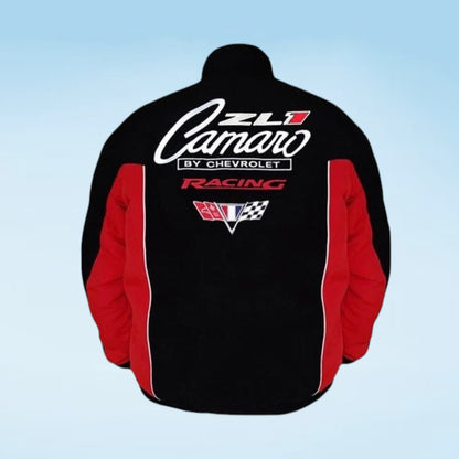 The back of a black and red racing jacket featuring 'ZL1 Camaro BY CHEVROLET RACING' in white and red text, with a Corvette emblem, set against a light blue gradient background.