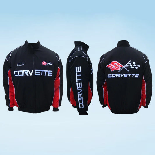 Black Corvette zip-up jacket shown from front, back, and side views on a light blue gradient background. The jacket features red side panels, white Corvette lettering, a red bowtie logo on the chest, and a large red, white, and black Corvette flag graphic on the back.