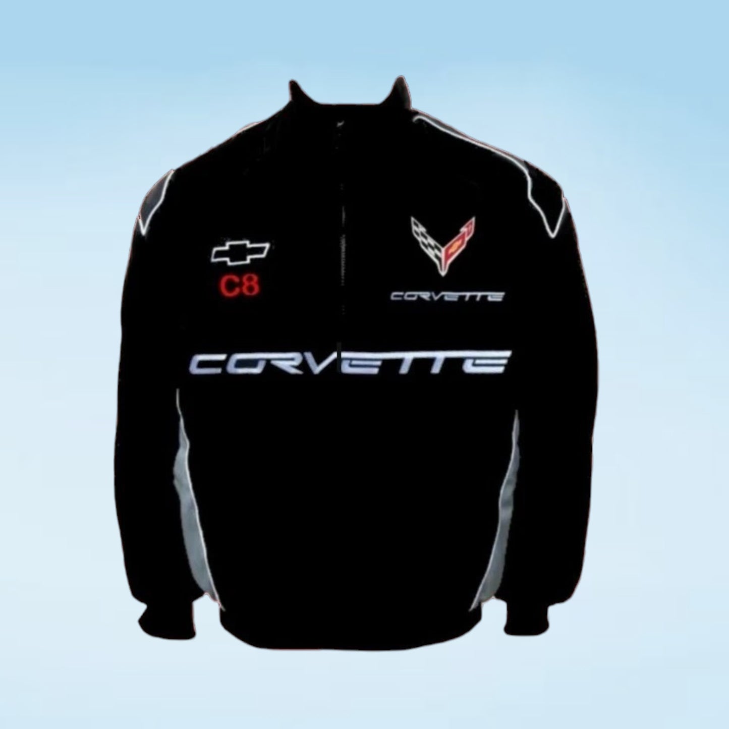 A black Corvette C8 zip-up jacket featuring white, red, and silver embroidered logos on the chest, displayed against a light blue gradient background.