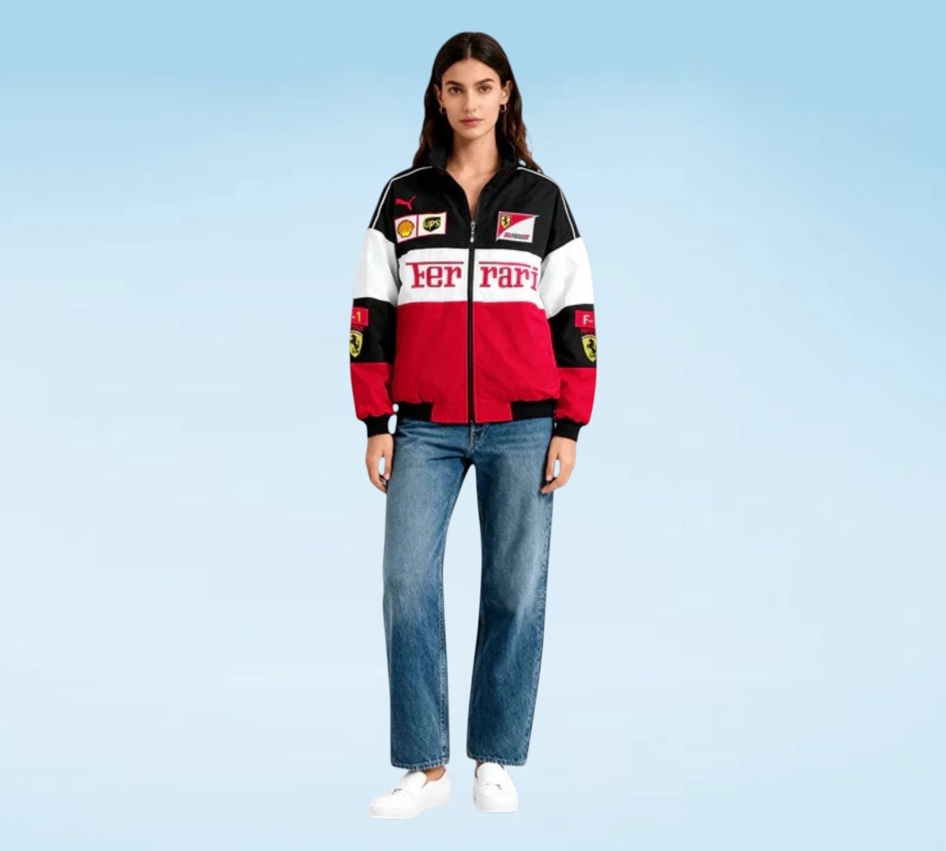 Person wearing a Ferrari tracksuit with a light blue background