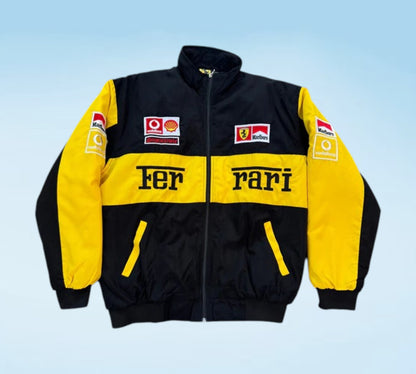 Black and yellow jacket with Ferrari branding on a light blue background