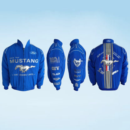 Blue Ford Mustang racing jackets shown from multiple angles on a light blue gradient background, featuring white and silver graphics, the Mustang logo, and Ford branding.