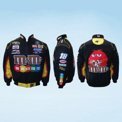 Three views of a black M&M's branded racing-style jacket with sponsor patches and colorful graphics, shown on a light blue gradient background.