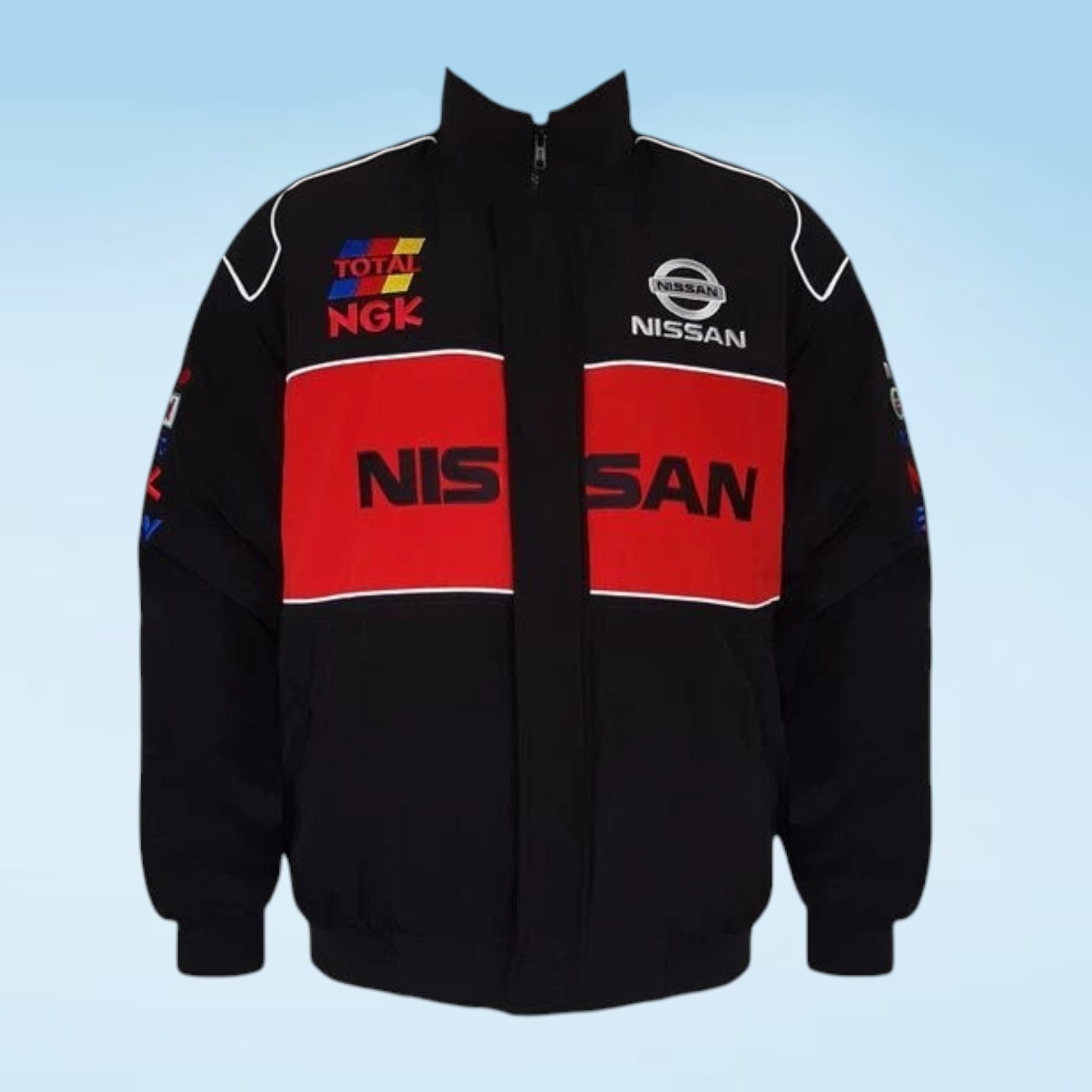A black zip-up racing jacket with bold red chest panels and white piping, featuring visible Nissan and Total NGK logos on the front against a light blue gradient background.