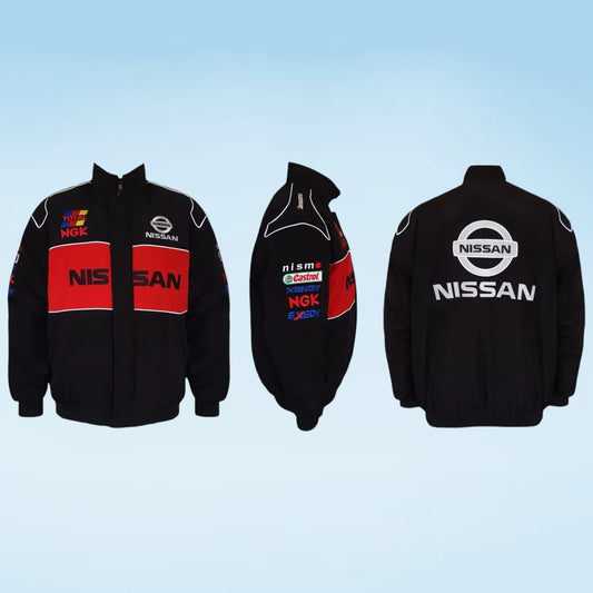 Black Nissan racing jacket shown from the front, back, and side views on a light blue gradient background. The jacket features red and white sponsor panels, including NGK, Castrol, and Eupen.