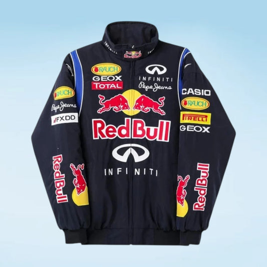 A black, white, and gray racing jacket with multiple sponsor logos including Santander, Vodafone, Mercedes-Benz, Mobil 1, aldo, SAP, and schöico, displayed against a light blue gradient background.