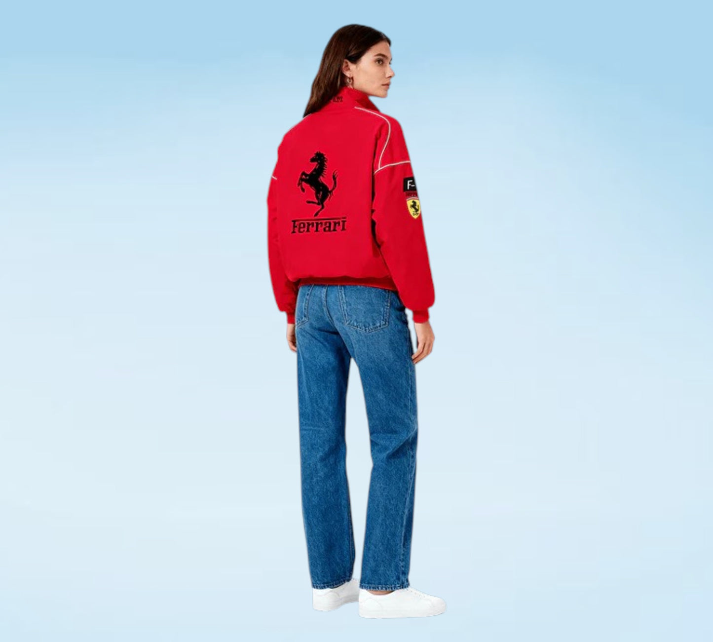 Person wearing a red Ferrari jacket with a blue background